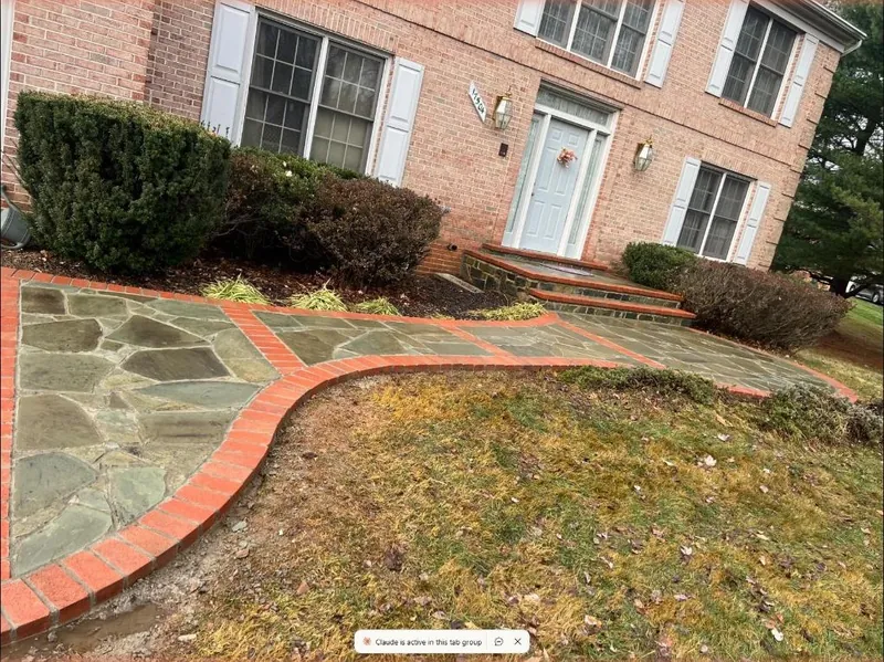 Stone walkway with brick border